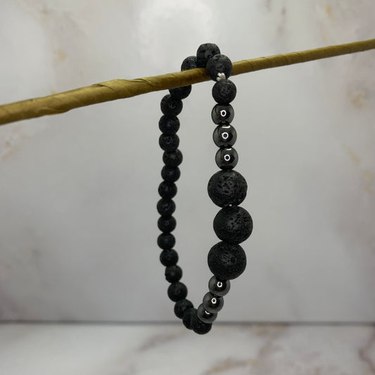 Handgeregen lavasteen armband – uniseks edelstenen sieraad met aardende werking
