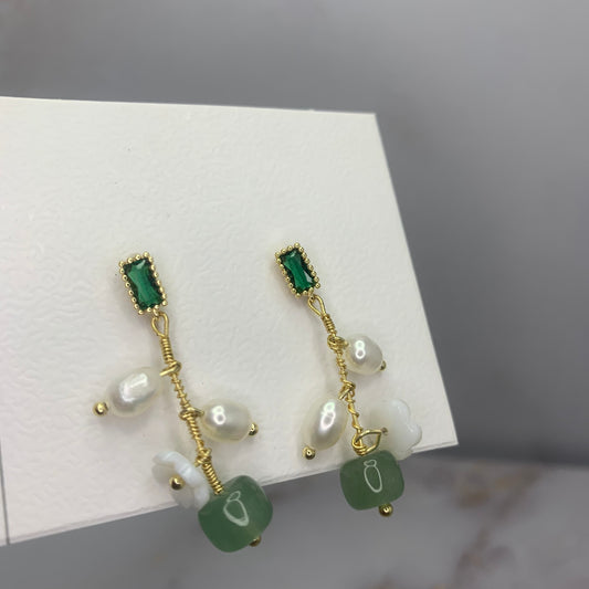 Oorbellen met Hetian jade en zoetwaterparels – handgemaakte elegante sieraden met spirituele betekenis