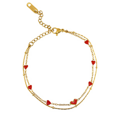 dubbelen gouden armband met rode hartjes 