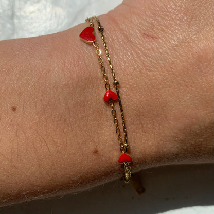 dubbele gouden armband mer rode hartjes 