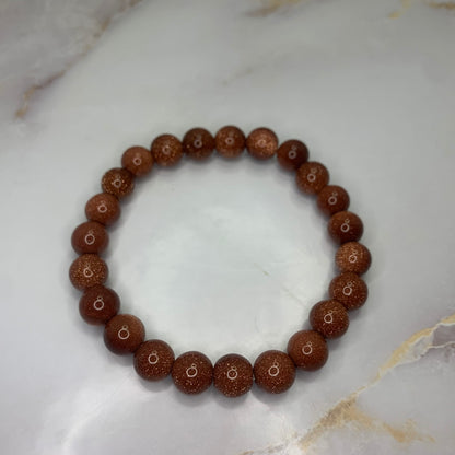 rode goudsteen 8mm kogelarmband 