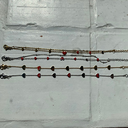 al mijn armbandjes op een rij zilver en goud 